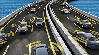 computer-generated image of cars on a motorway. each car is surrounded by a radius, meant to indicate sensors