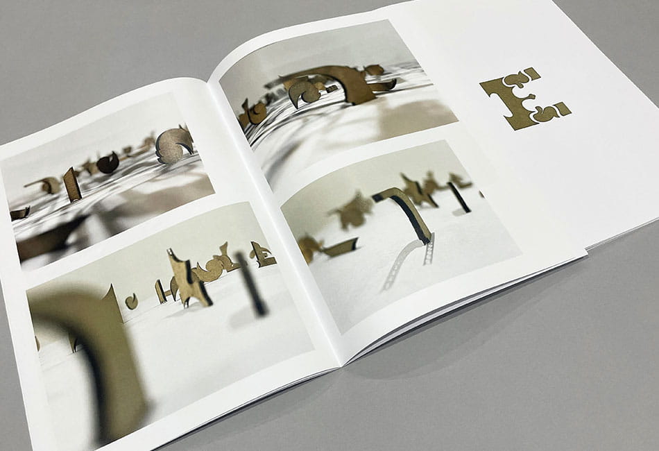 A Graphic Arts degree students work showing different sized typography