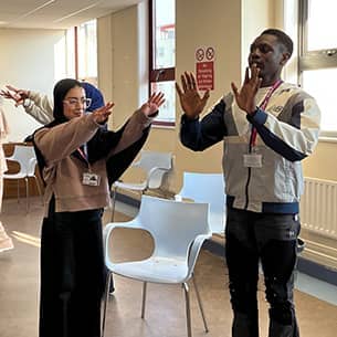 Students taking part in a drama club workshop for young refugees and asylum seekers