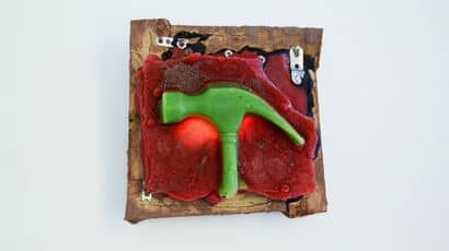 Student artwork of a green hammer on a purple background. Image credit: Barnaby Prendergast.