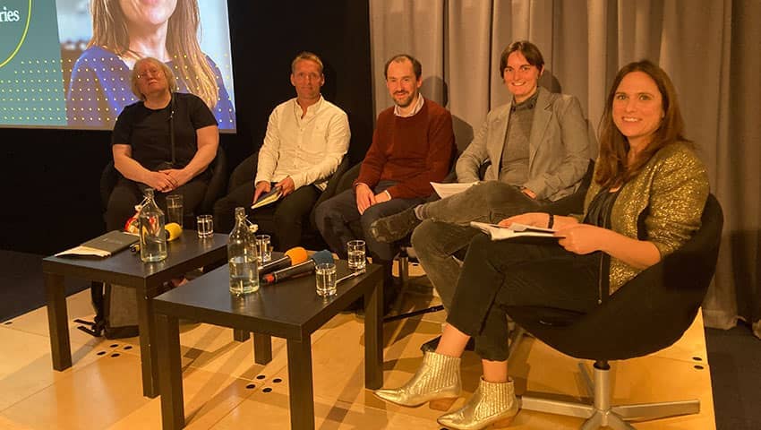 Event panel sitting on the stage before the talk.