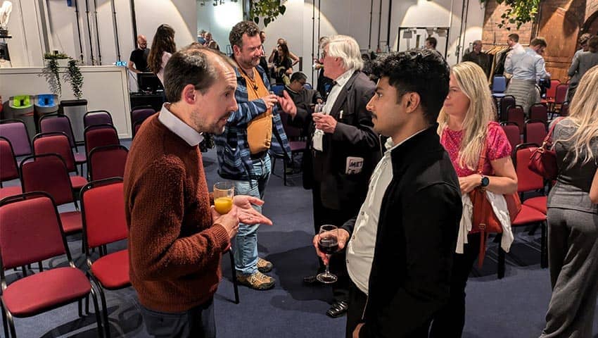 Attendees networking at the From Grount to Orbit event.