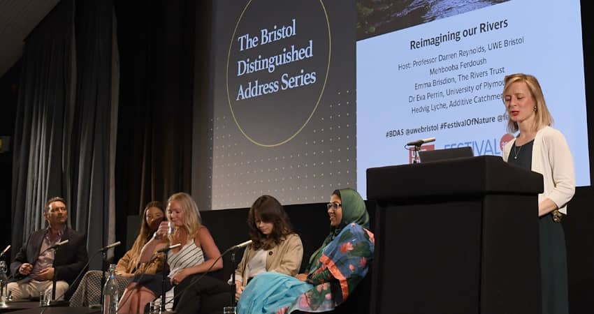 A UWE Bristol staff member introducing the panel for Bristol Distinguished Address Series, June 2025.
