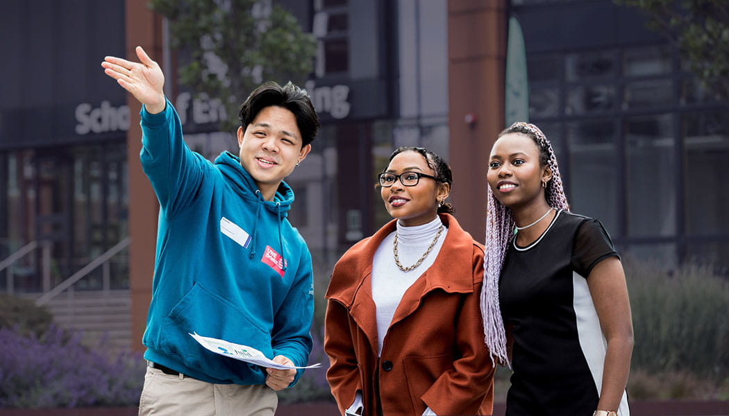 Student Ambassador giving help at Open Day