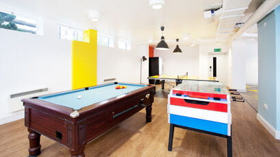 Marketgate communal area with pool table and football table.