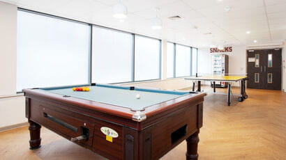 Communal area in Nelson and Drake House with pool table and table tennis.