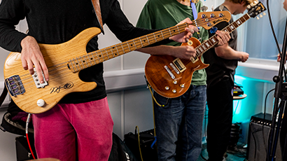 students playing guitar and bass