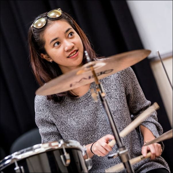 Musician playing the drums