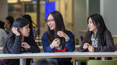 Group of students talking in OneZone on Frenchay Campus