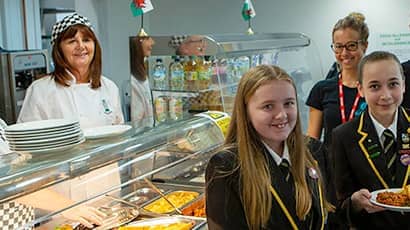 Schoolchildren in canteen.