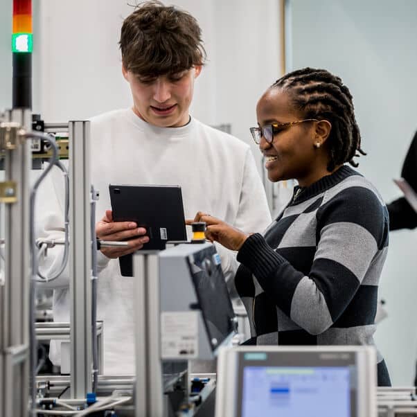 Engineering students in a lab.