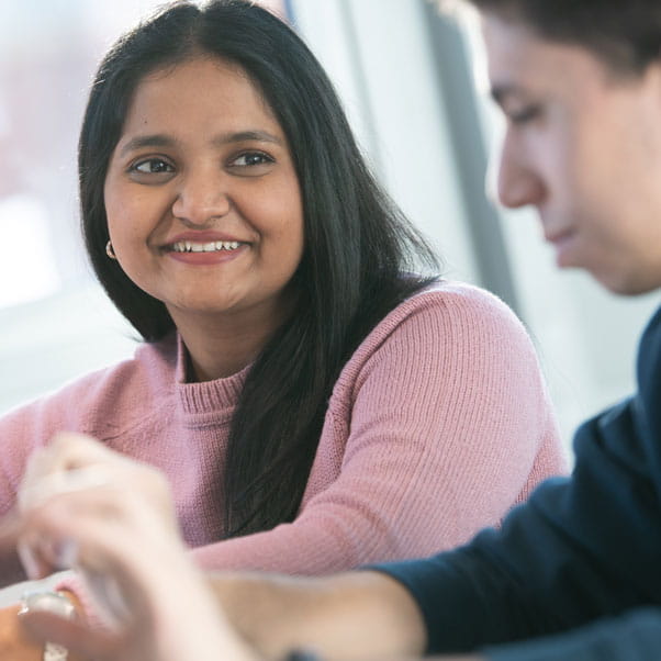 Two students working together.